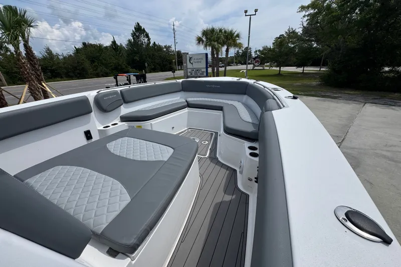 Slide: The Image of 2026 NauticStar 332 Offshore boat with spacious seating and sleek design. - 20