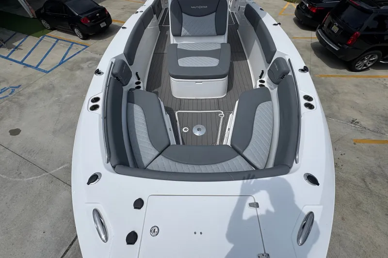 Slide: The Image of 2026 NauticStar 332 Offshore boat with spacious seating and sleek design. - 23