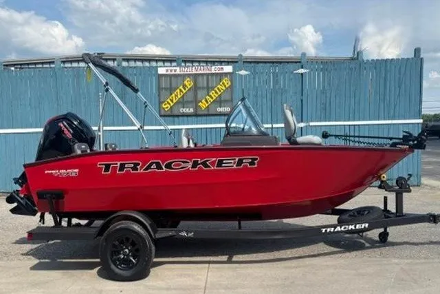 The Image of 2027 Tracker Pro Guide V-175 Combo boat in vibrant red on a trailer. - 0