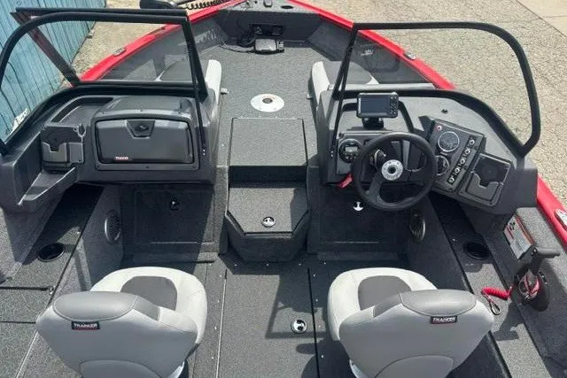 Slide: The Image of 2027 Tracker Pro Guide V-175 Combo boat interior with dual seats and modern dashboard. - 14