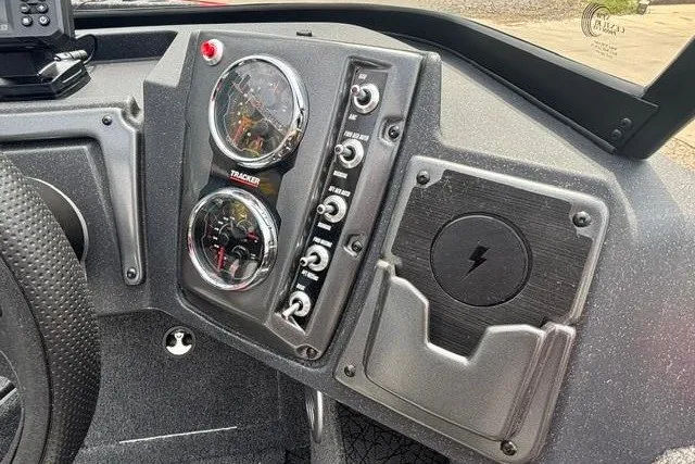 Slide: The Image of Dashboard of 2027 Tracker Pro Guide V-175 Combo boat with gauges and controls. - 18