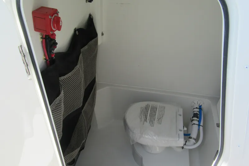 Slide: The Image of Interior of 2027 Parker 274 Fathom boat with compact marine toilet. - 20