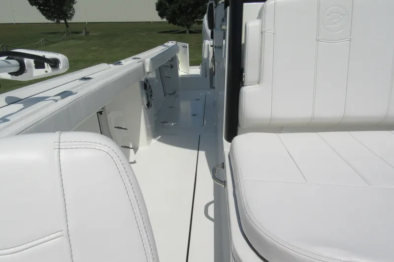 Slide: The Image of 2027 Parker 274 Fathom boat interior with white seating and sleek design. - 34