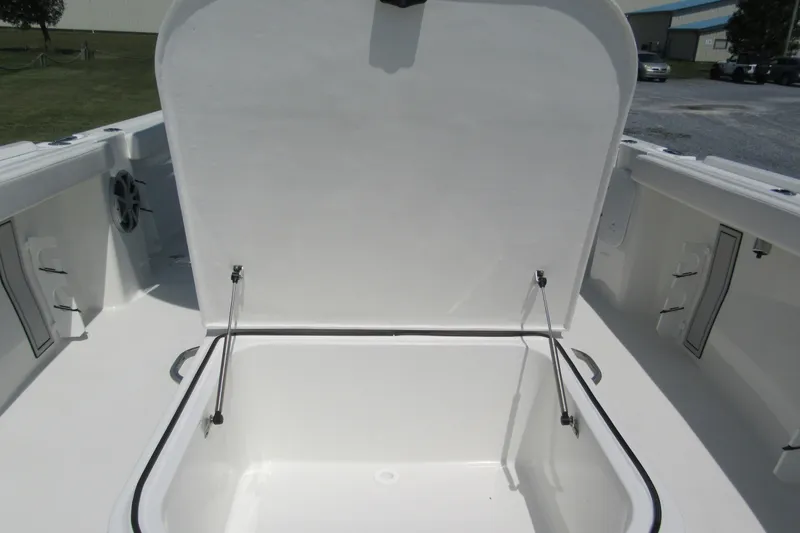 Slide: The Image of Open storage compartment on 2027 Parker 274 Fathom boat, showcasing spacious interior. - 28