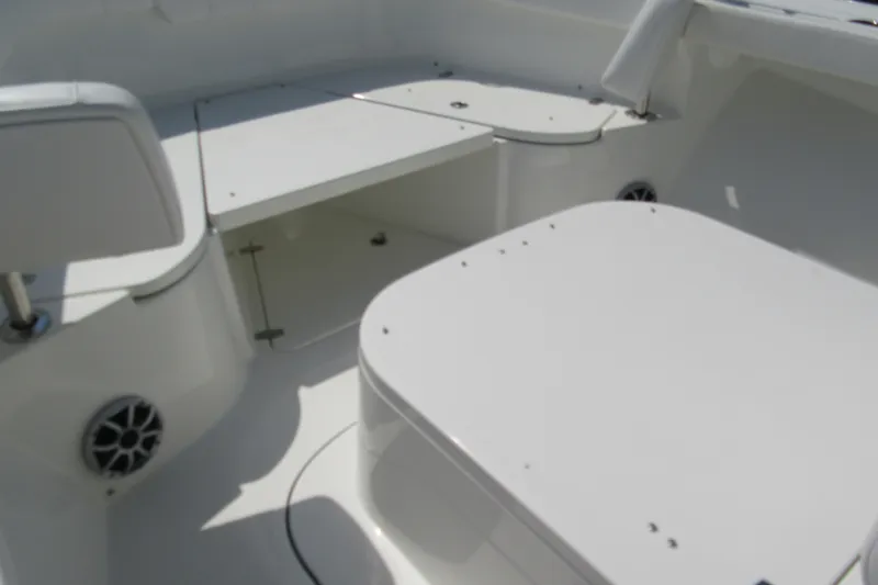 Slide: The Image of Interior view of 2027 Parker 274 Fathom boat, featuring seating and storage compartments. - 19