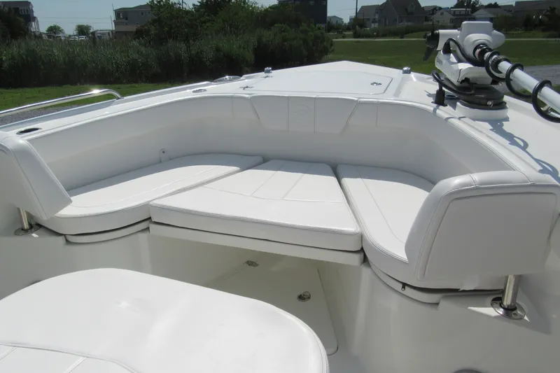 Slide: The Image of Luxurious seating on 2027 Parker 274 Fathom boat, featuring white cushioned benches. - 25