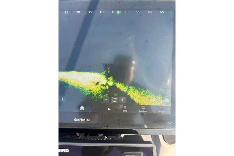 Slide: The Image of Fishfinder display on a 2026 Skeeter ZXE20 boat, showing underwater terrain. - 22