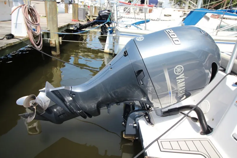 Slide: The Image of Yamaha 200 outboard motor on a 2022 Sea Fox 228 Commander boat at dock. - 4