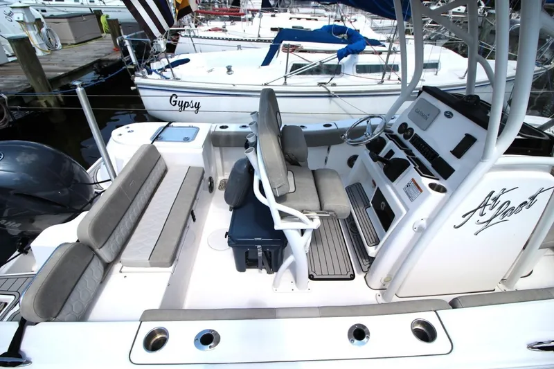 Slide: The Image of 2022 Sea Fox 228 Commander boat interior with seating and control panel. - 9
