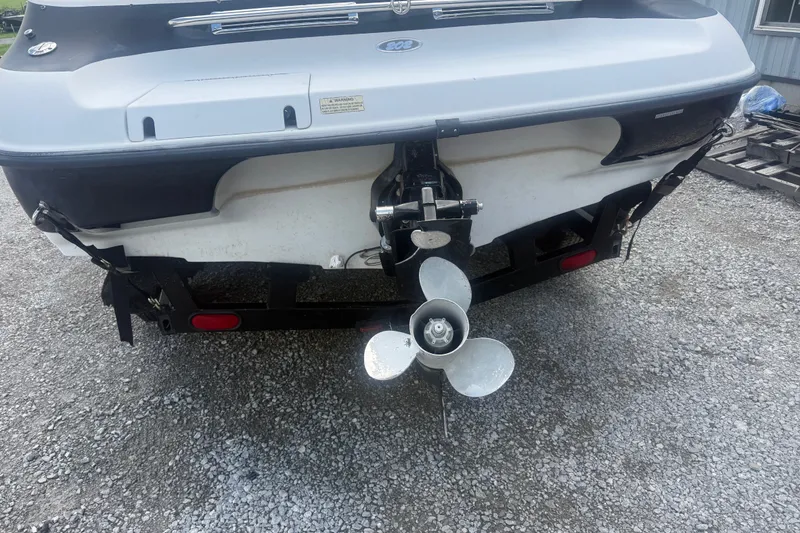 Slide: The Image of Rear view of a 2000 Crownline 202 BR boat with visible propeller. - 6