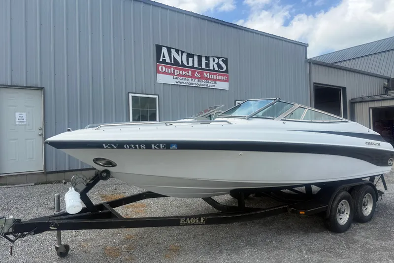 Slide: The Image of 2000 Crownline 202 BR boat on trailer at Anglers Outpost & Marine. - 14