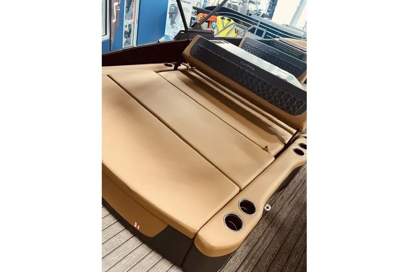 Slide: The Image of 2026 Harris FloteBote 230 Sunliner with tan seating and cup holders. - 13