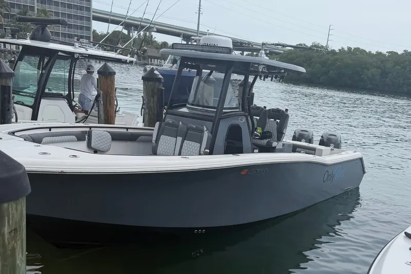 The Image of 2020 Tidewater 280 CC Adventure boat docked by the water. - 21