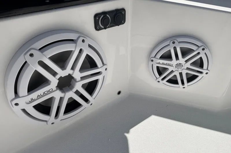 Slide: The Image of JL Audio speakers on a 2020 Blackfin 242 CC boat, enhancing sound quality. - 31
