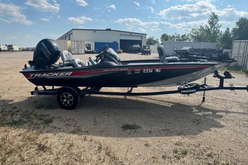 The Image of 2018 Tracker Pro Team 195 TXW 40th Anniversary Edition boat on trailer. - 0