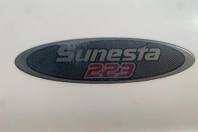 Slide: The Image of Oval emblem displaying "Sunesta 223" on a textured background. - 9
