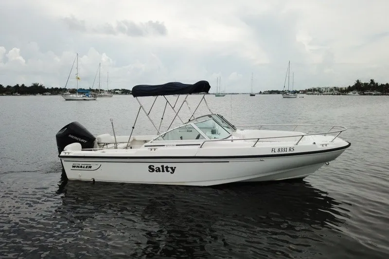 Slide: The Image of 1998 Boston Whaler 20 Ventura Bowrider named "Salty" on calm waters. - 5