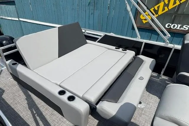 Slide: The Image of 2026 Sun Tracker Party Barge 22 RF XP3 with spacious seating and cup holders. - 20