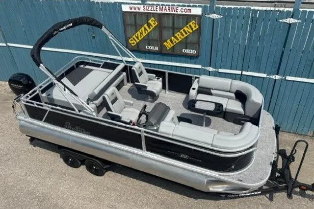 The Image of 2026 Sun Tracker Party Barge 22 RF XP3 pontoon boat with spacious seating and sleek design. - 0