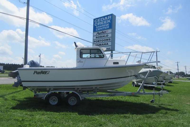 The Image of 2027 Parker 217 Explorer boat on trailer at Cedar Creek Marine Center. - 1
