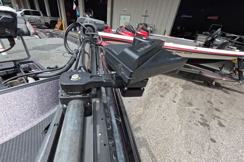 Slide: The Image of 2021 Caymas boat with advanced trolling motor setup in a garage. - 37