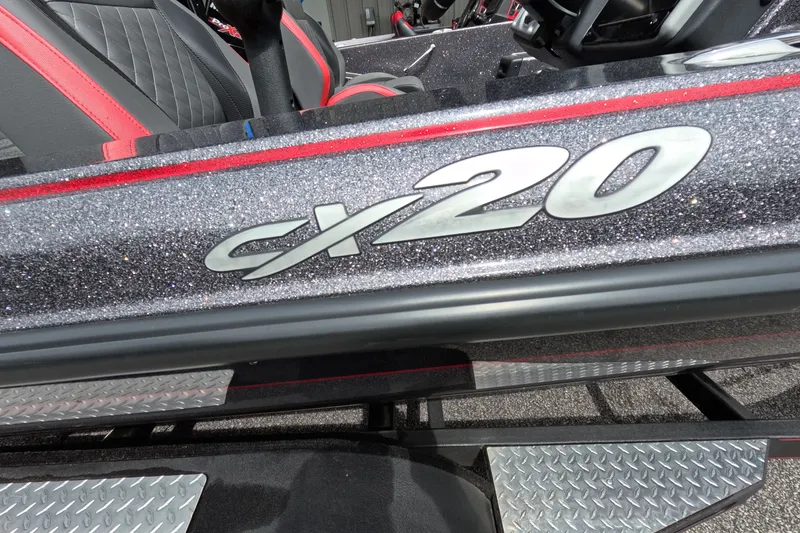Slide: The Image of 2021 Caymas CX20 boat with glittery finish and red accents. - 33