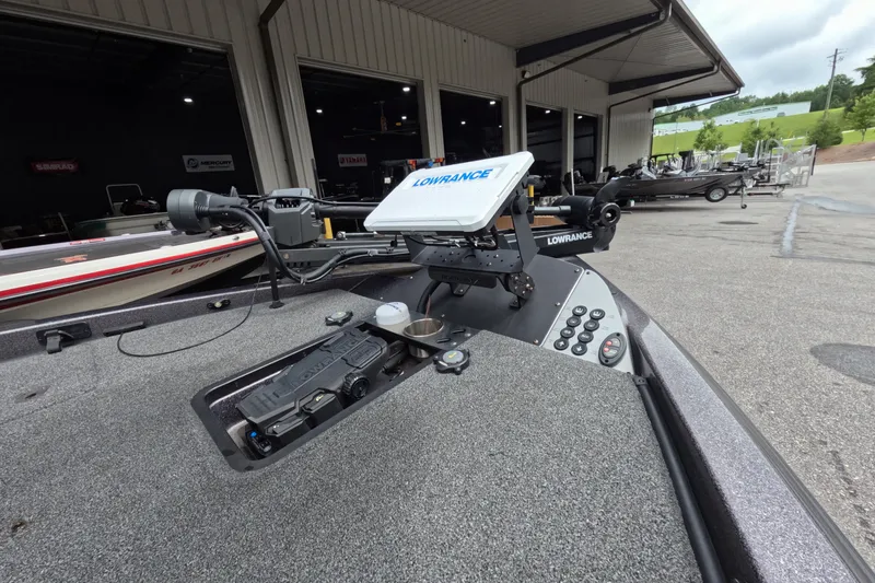 Slide: The Image of 2021 Caymas boat with Lowrance electronics at a dealership, showcasing advanced navigation equipment. - 22
