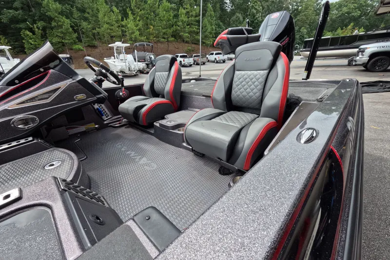 Slide: The Image of 2021 Caymas boat interior with sleek seats and modern dashboard design. - 26