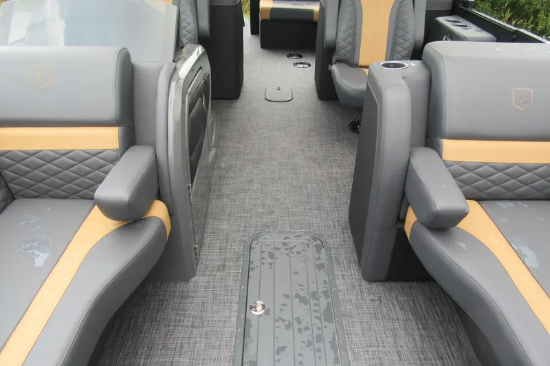 Slide: The Image of Interior of 2027 Godfrey Monaco 235 ULC pontoon boat with luxurious seating and modern design. - 17