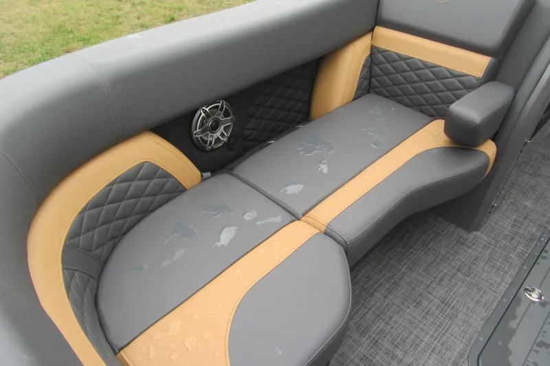 Slide: The Image of Luxurious seating on 2027 Godfrey Monaco 235 ULC boat with stylish upholstery and speaker. - 5