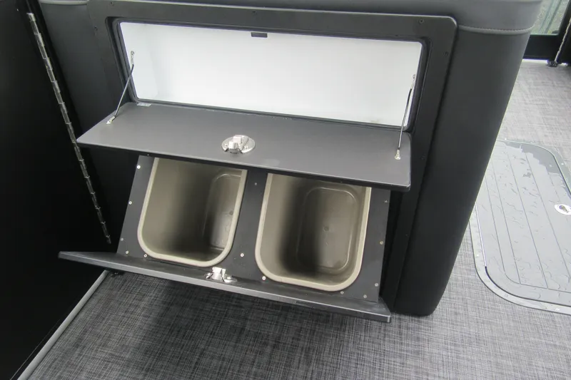 Slide: The Image of Storage compartment with bins on a 2027 Godfrey Monaco 235 ULC boat. - 14