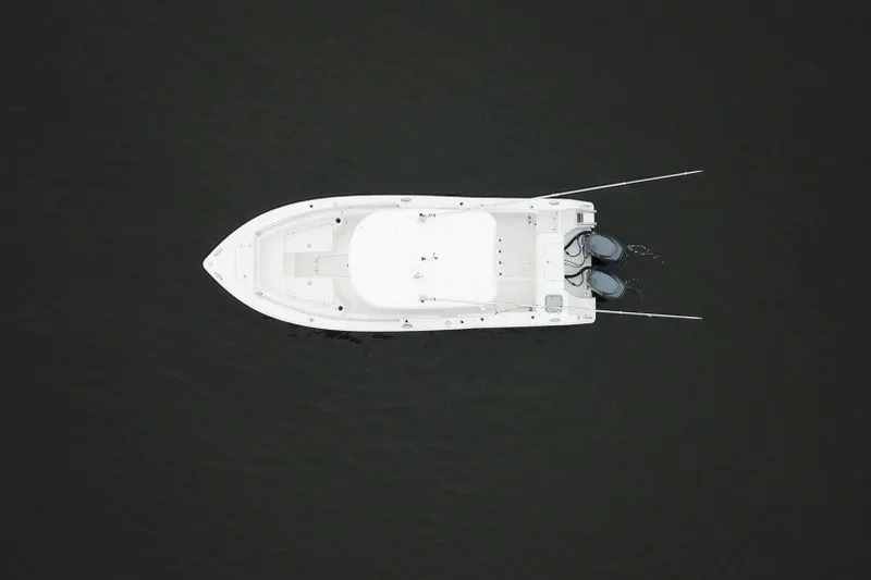Slide: The Image of Aerial view of a 2014 Sea Hunt Gamefish 25 boat on dark water. - 5
