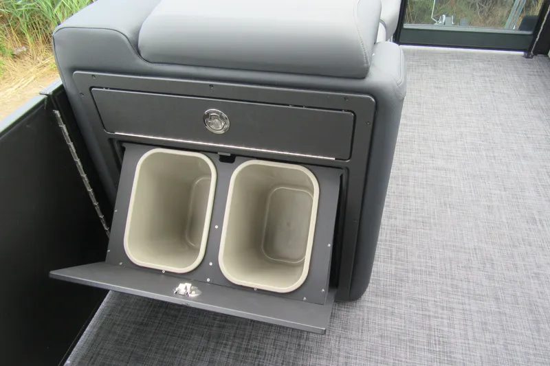 Slide: The Image of Interior of 2027 Godfrey Sweetwater 2286 SFLC with dual storage bins. - 13