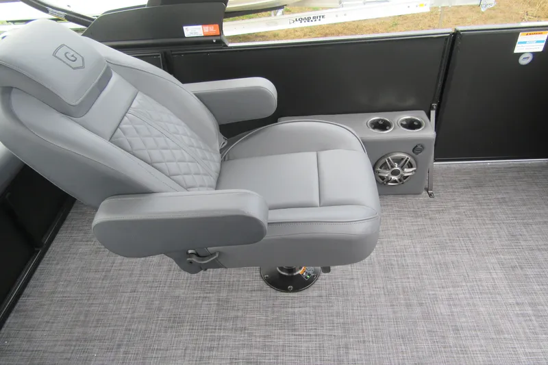 Slide: The Image of Luxurious seating on 2027 Godfrey Sweetwater 2286 SFLC boat with cup holders and speaker. - 12