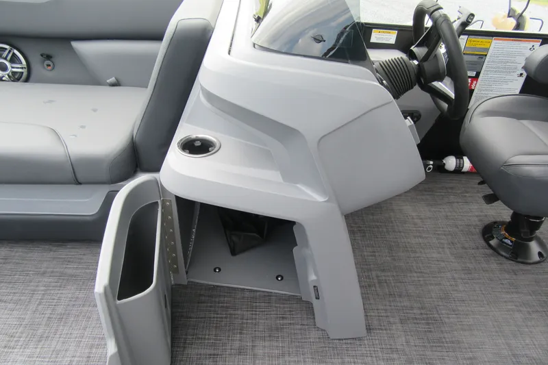 Slide: The Image of Interior of 2027 Godfrey Sweetwater 2286 SFLC boat, featuring helm and seating area. - 8