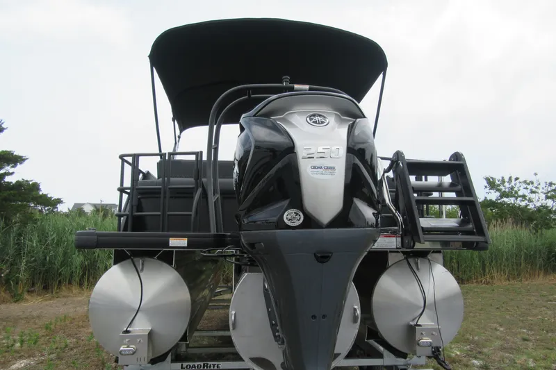 Slide: The Image of 2027 Godfrey Sweetwater 2286 SFLC pontoon boat with powerful outboard motor. - 3