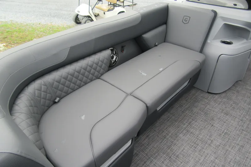 Slide: The Image of Luxurious seating on 2027 Godfrey Sweetwater 2286 SFLC pontoon boat, featuring elegant gray upholstery. - 7