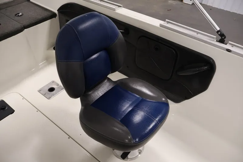 Slide: The Image of Blue and black seat in 2012 Ranger 1860 Angler boat interior. - 27