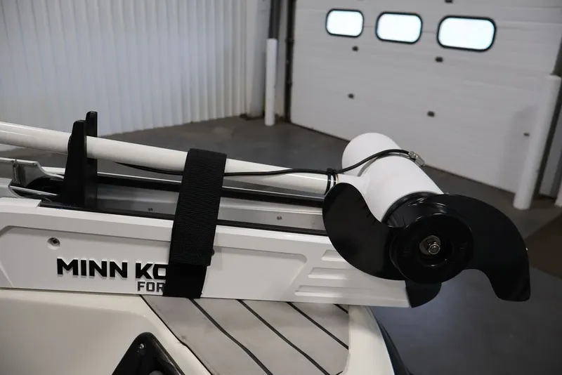 Slide: The Image of Minn Kota trolling motor on 2012 Ranger 1860 Angler boat in a garage setting. - 30