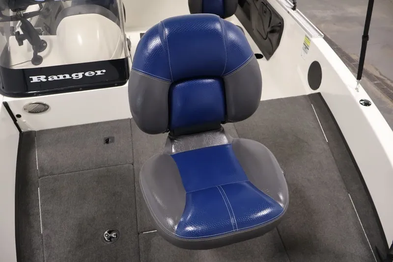 Slide: The Image of 2012 Ranger 1860 Angler boat interior with blue and gray seating. - 18