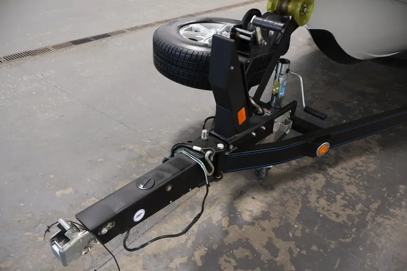 Slide: The Image of Trailer hitch and spare tire of 2012 Ranger 1860 Angler boat on concrete floor. - 37