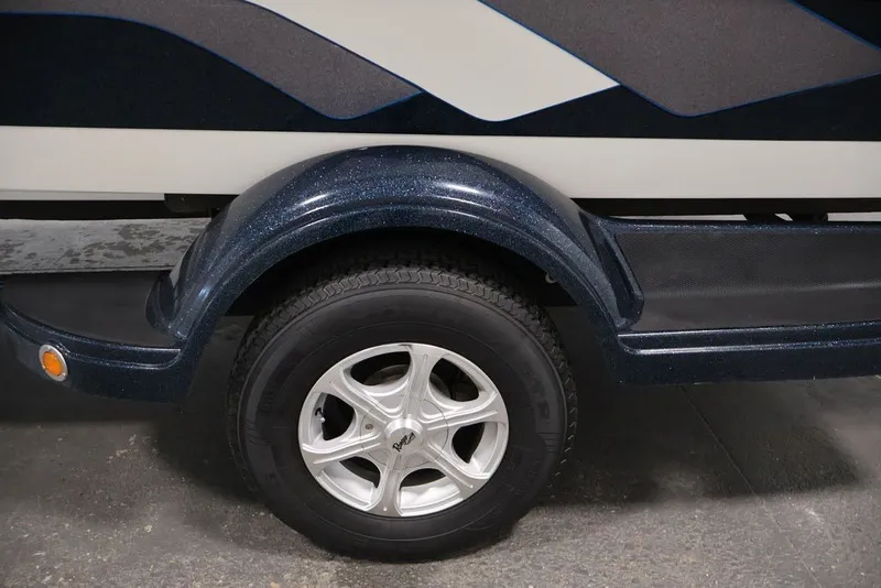 Slide: The Image of 2012 Ranger 1860 Angler trailer wheel and fender detail, showcasing sleek design. - 39