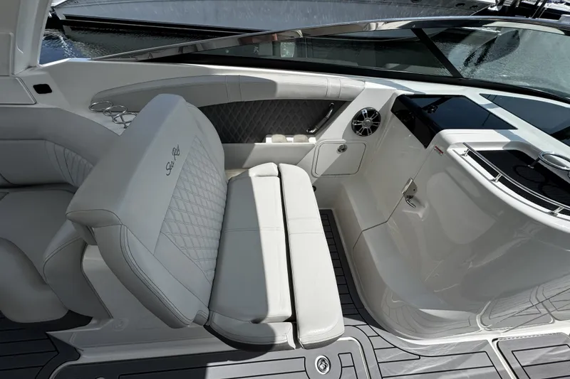 Slide: The Image of Luxurious interior of 2021 Sea Ray SLX 350 Outboard boat with elegant seating. - 12