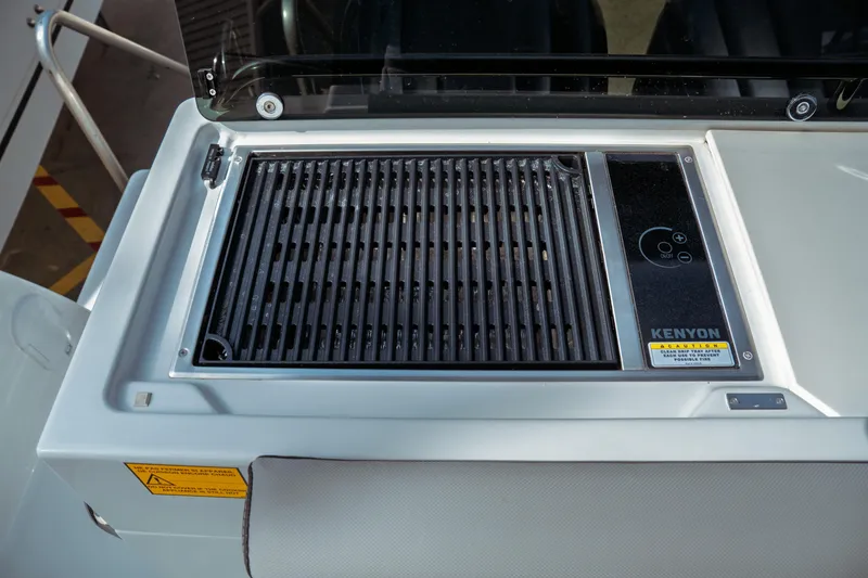 Slide: The Image of Kenyon grill on 2025 Jeanneau NC 895 Sport Series 2 boat deck. - 14