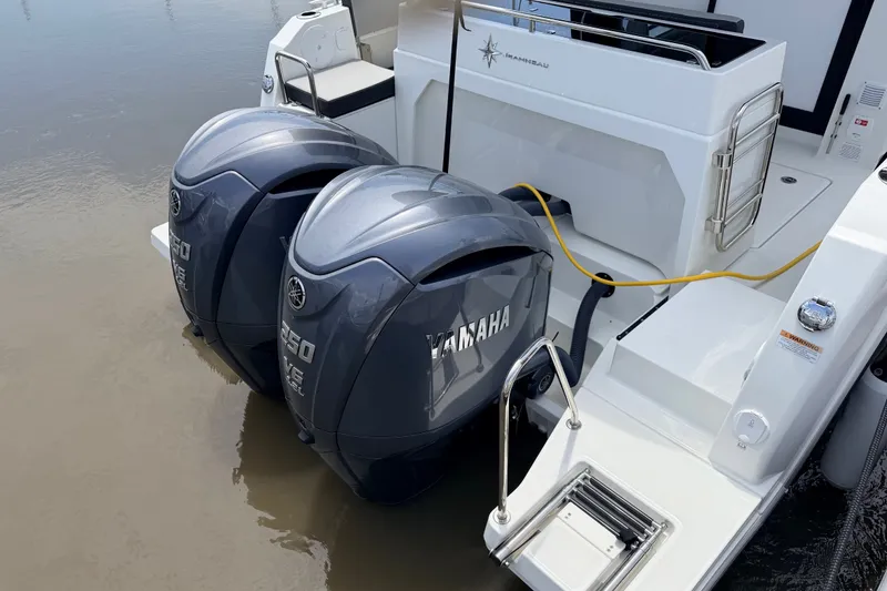 Slide: The Image of Twin Yamaha outboard engines on a 2026 Jeanneau NC 895 Sport Series 2 boat. - 5
