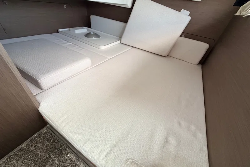 Slide: The Image of Interior cabin of 2026 Jeanneau NC 895 Sport Series 2, featuring a comfortable bed setup. - 47