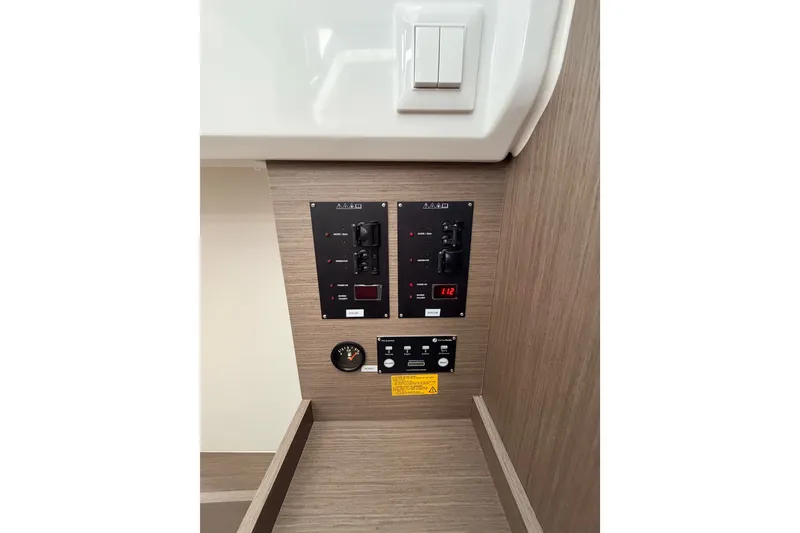 Slide: The Image of Control panel of 2026 Jeanneau NC 895 Sport Series 2 boat interior. - 48