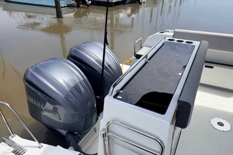 Slide: The Image of 2026 Jeanneau NC 895 Sport Series 2 with dual Yamaha outboard engines docked. - 6