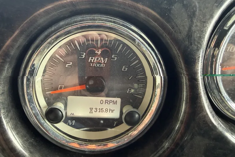 Slide: The Image of Close-up of 2012 Yamaha 242 Limited S tachometer showing 0 RPM and 315.8 hours. - 4