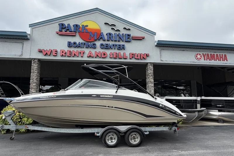 The Image of 2012 Yamaha 242 Limited S boat on trailer at Park Marine Boating Center. - 0